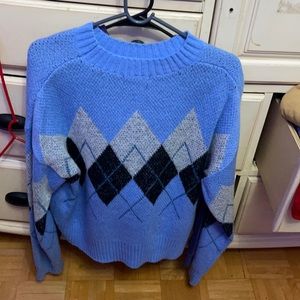 Blue Argyle crew sweater.